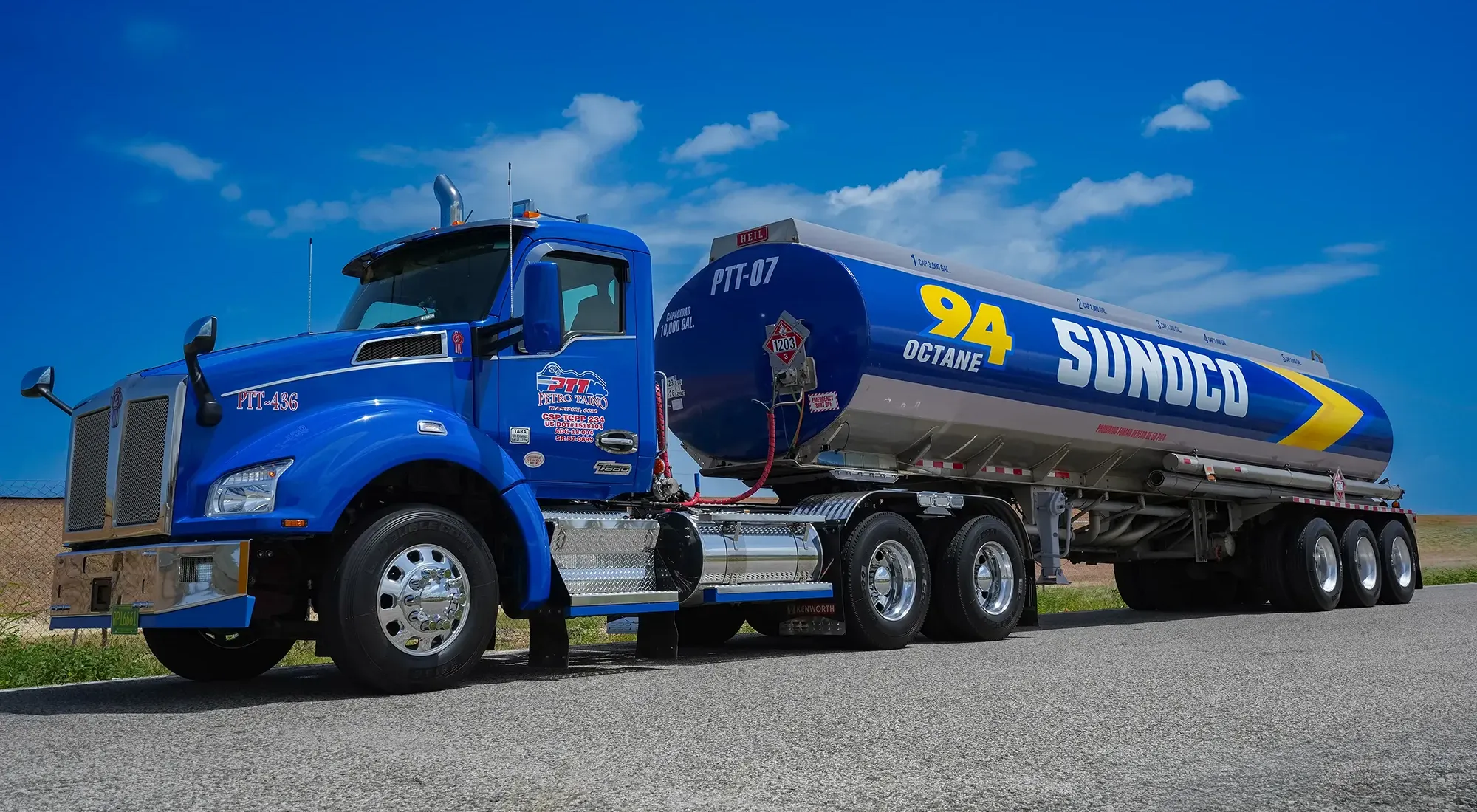 Petro Taino branded truck driving down road